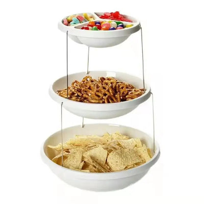 3-tier collapsible snack bowl stand filled with candy, pretzels and chips