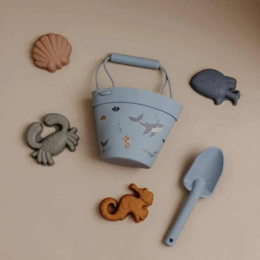 Blue silicone beach bucket set with spade and sea creature moulds