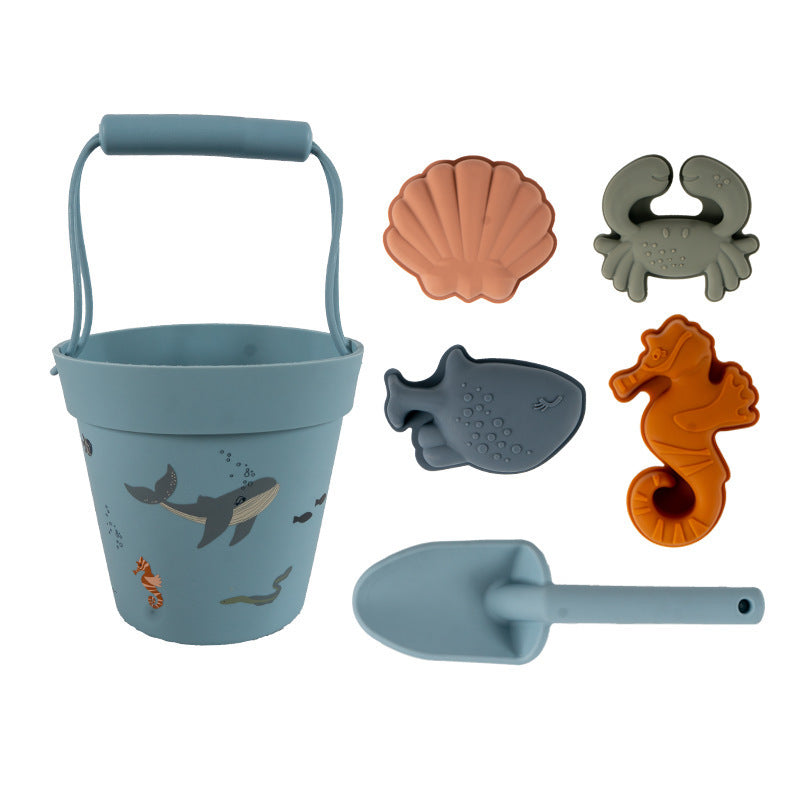 Blue silicone beach bucket set with spade and sea creature moulds
